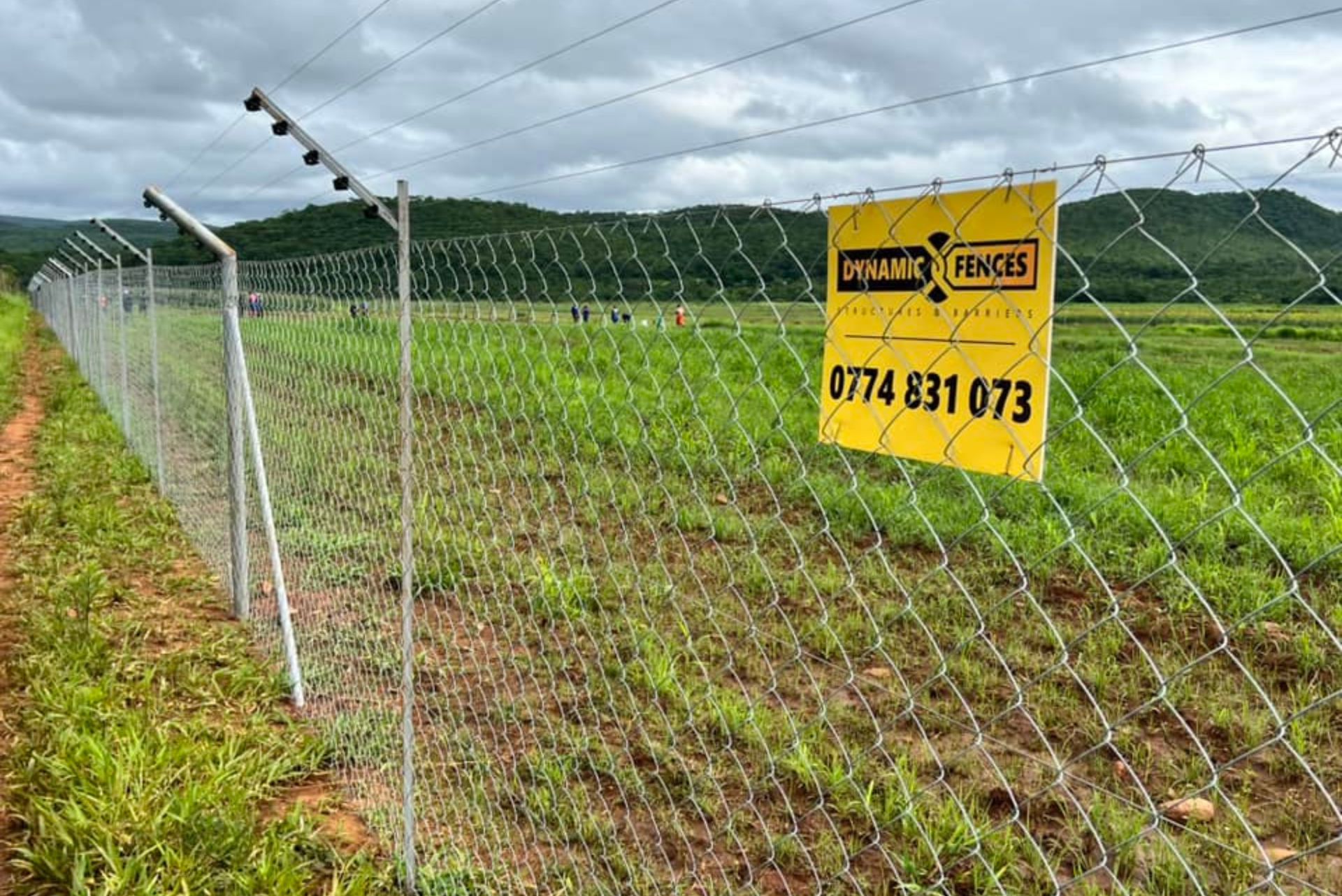 Dynamic Fences installation team on commercial fencing project in Harare, Zimbabwe